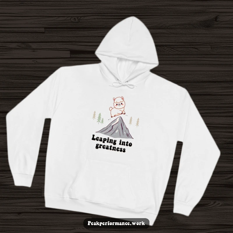 Funny hoodie with a fluffy cartoon alpaca energetically leaping over a jagged mountain peak, symbolizing freedom and fun.