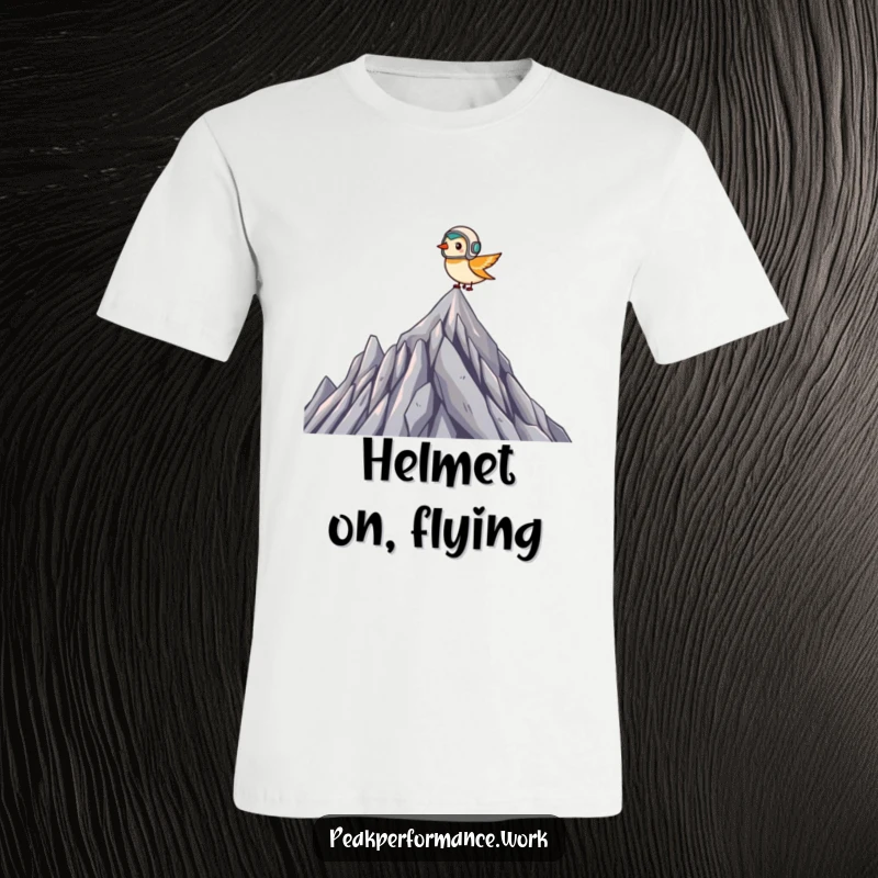 Funny T-Shirt: Tiny bird wearing a helmet soars over a rugged mountain peak, embodying fearless adventure.
